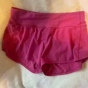 Speed up mid rise Lululemon shorts, 4 inch inseam.